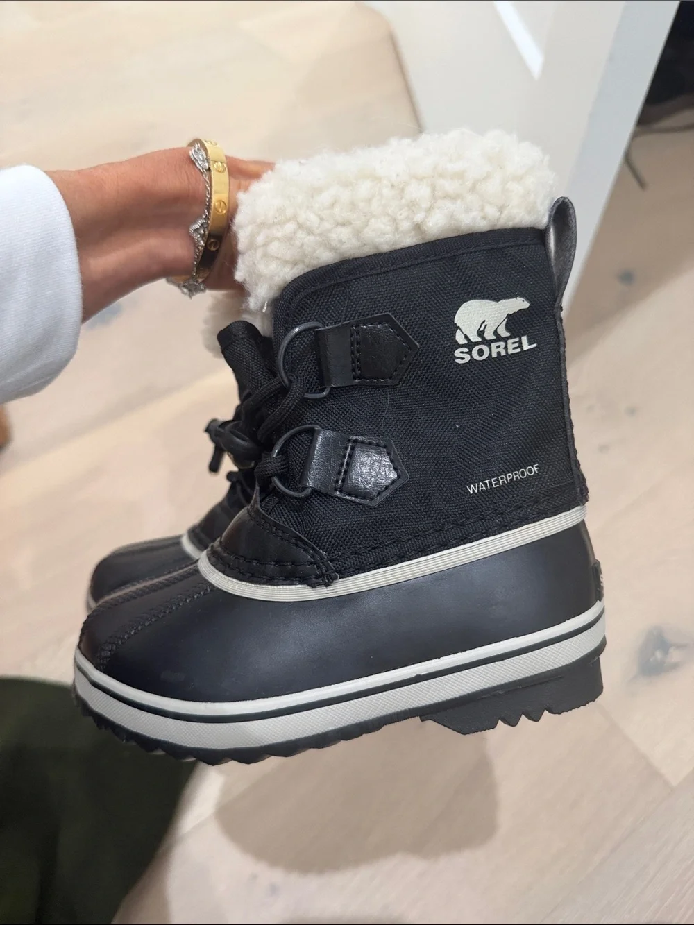 Sorel Black Kids Snow Boots with Cream Shearling Cuff